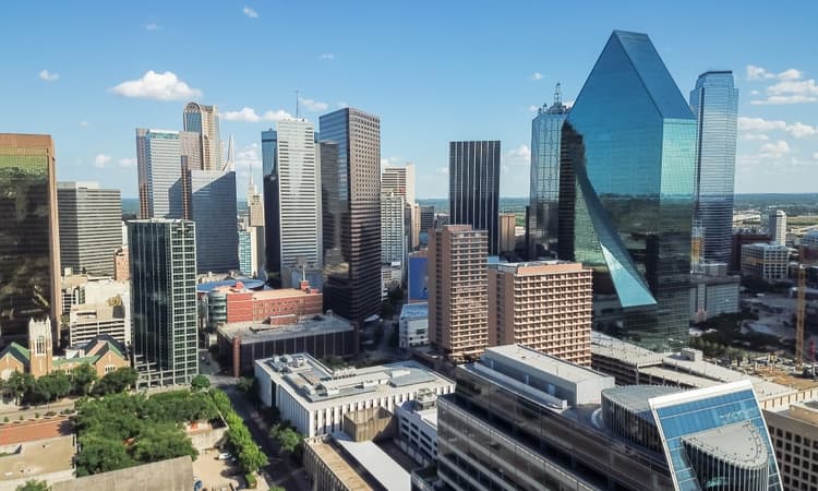 longhorn charter bus dallas texas skyline