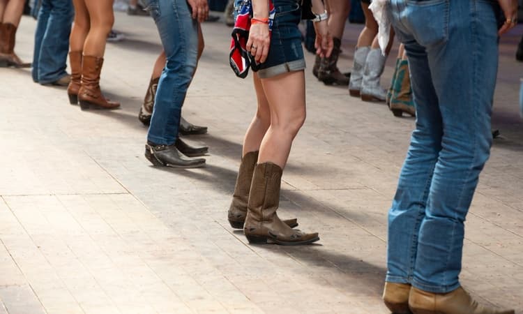 longhorn charter bus dallas cowboy boots dancing in country bar