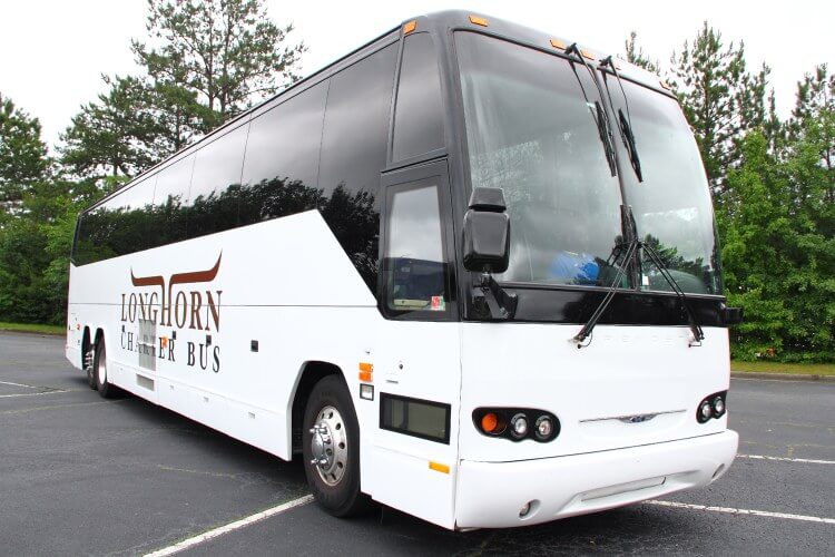 A 56-passenger charter bus